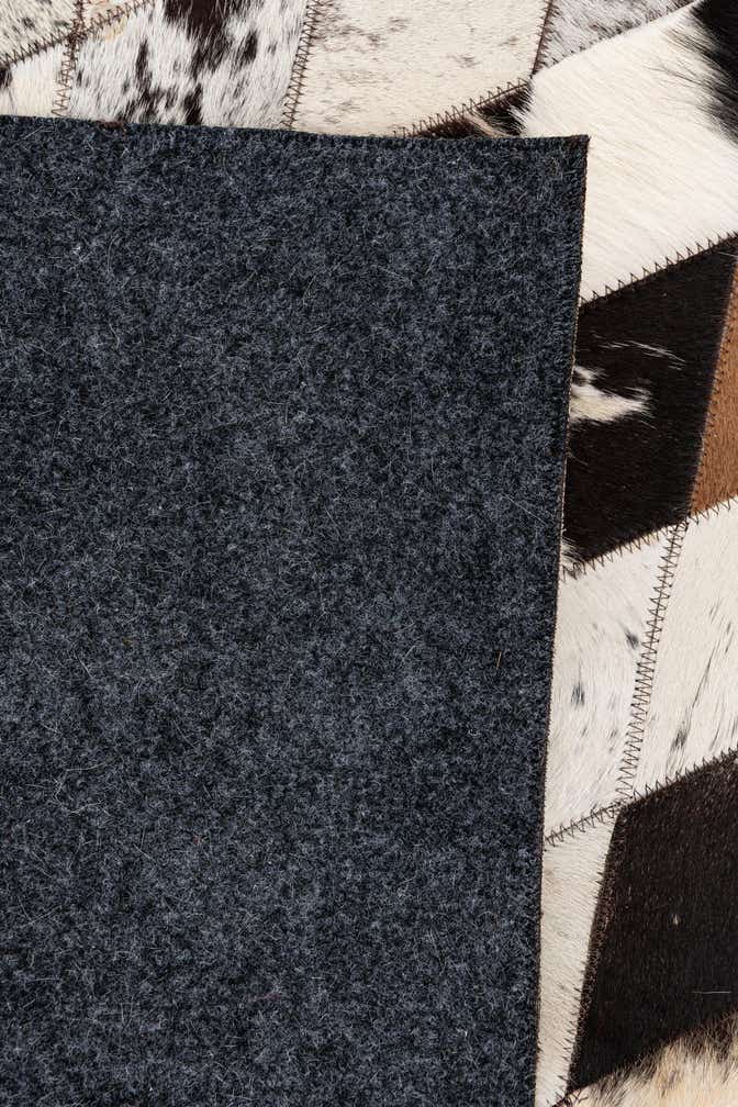 5' 7 x 8' Cowhide Stocks Rug