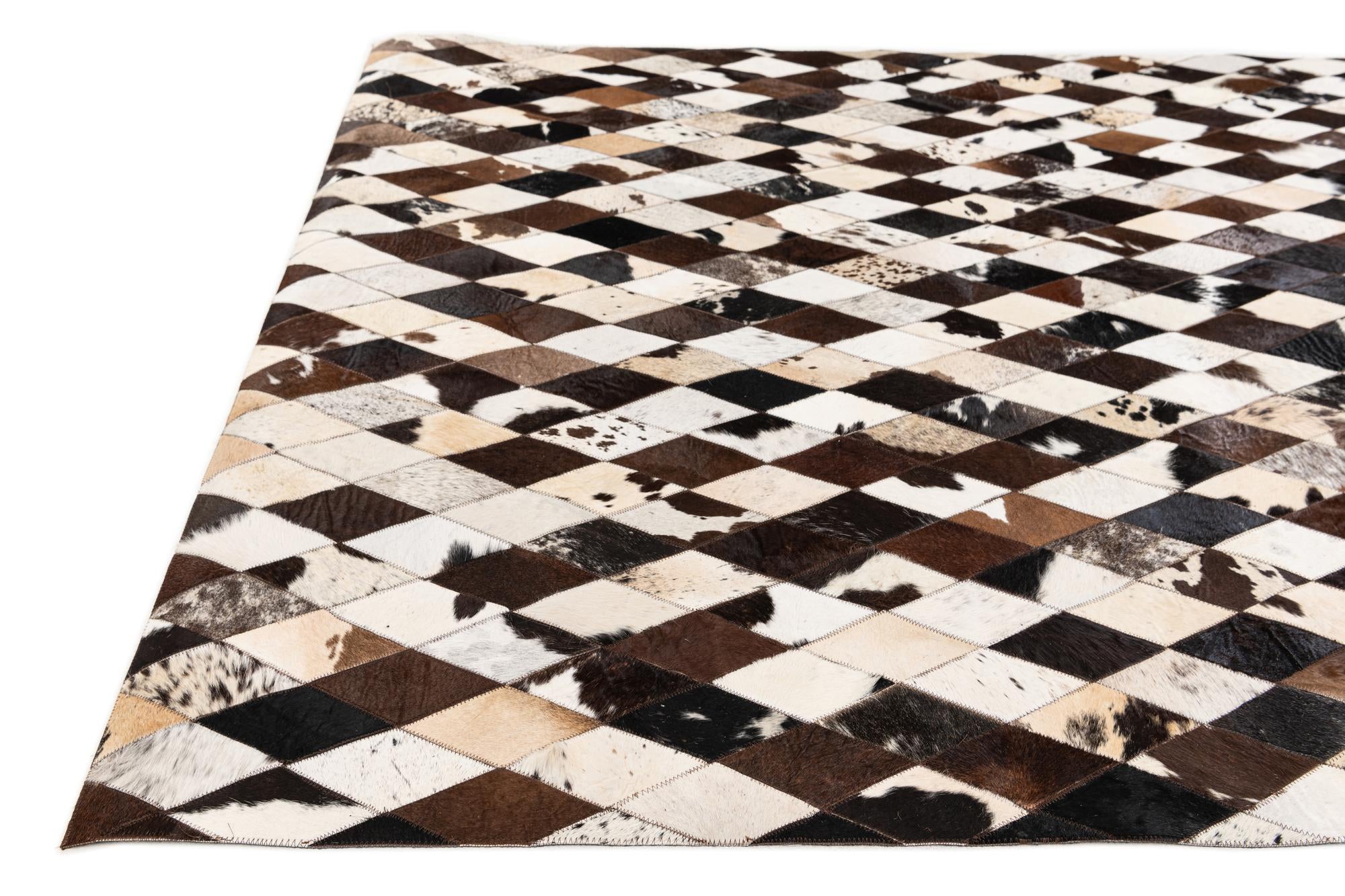 5' 7 x 8' Cowhide Stocks Rug