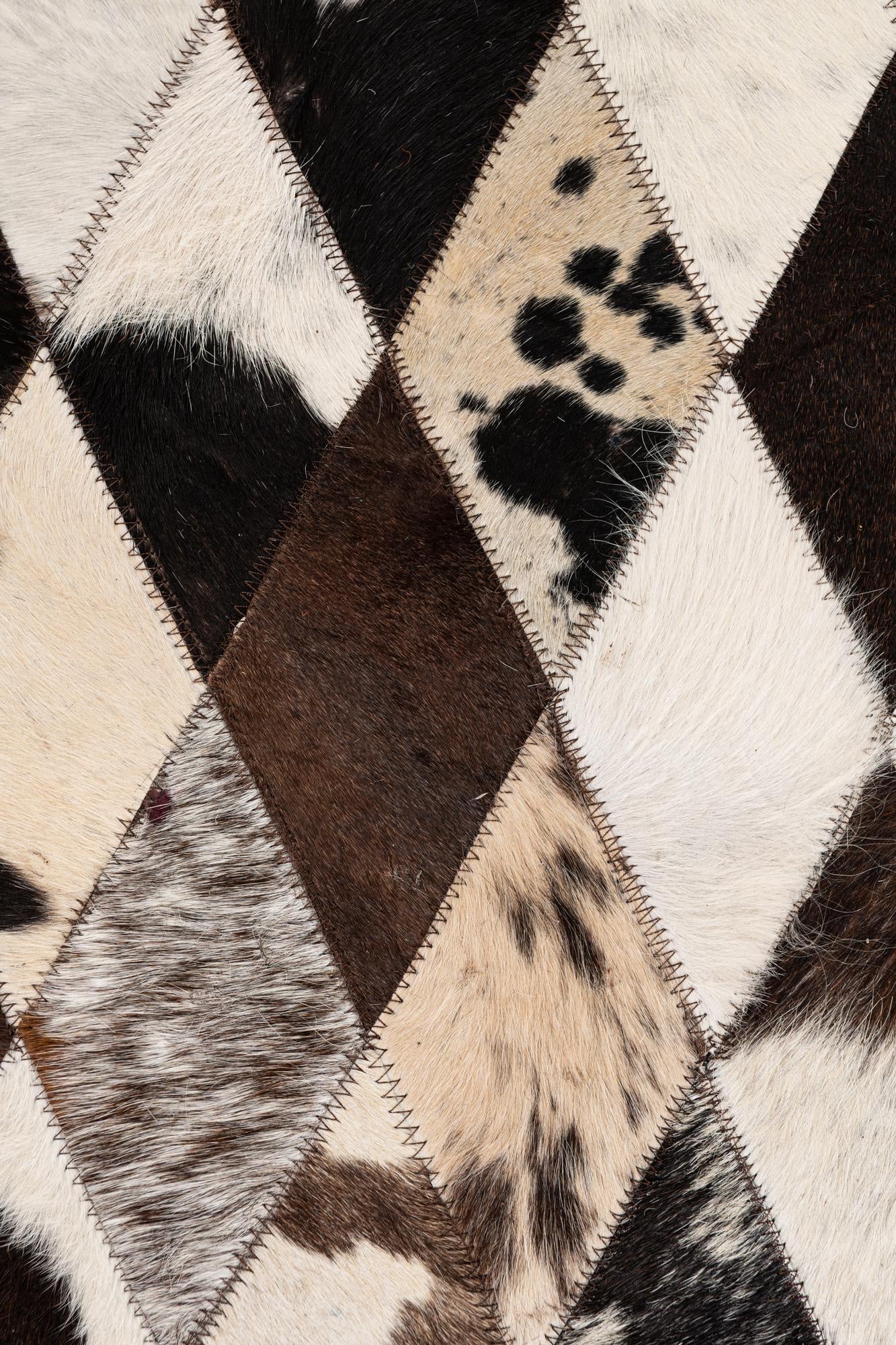 5' 7 x 8' Cowhide Stocks Rug