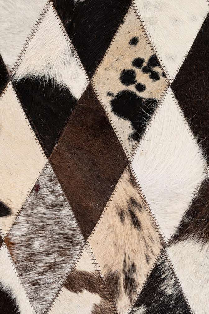 5' 7 x 8' Cowhide Stocks Rug