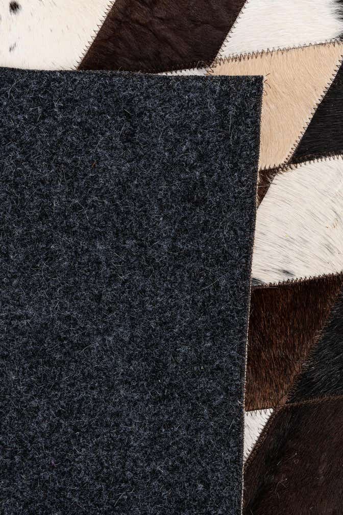 5' 7 x 8' Cowhide Stocks Rug