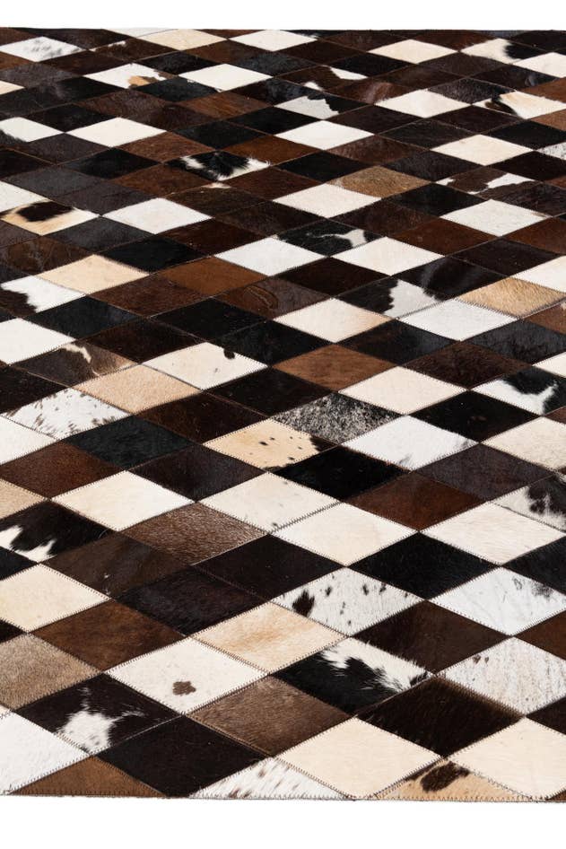 Detail image of 5' 2 x 8' 1 Cowhide Stocks Rug