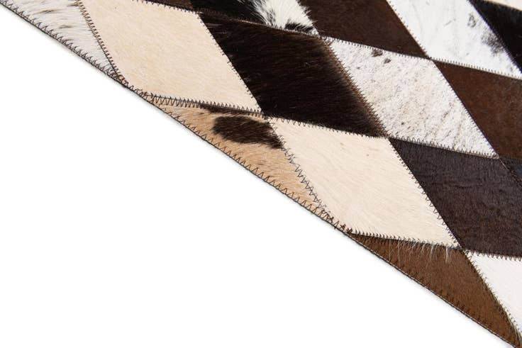 Detail image of 5' 2 x 8' 1 Cowhide Stocks Rug