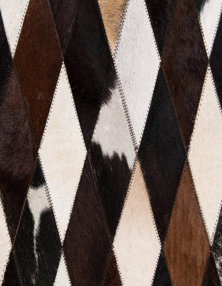 Detail image of 5' 2 x 8' 1 Cowhide Stocks Rug