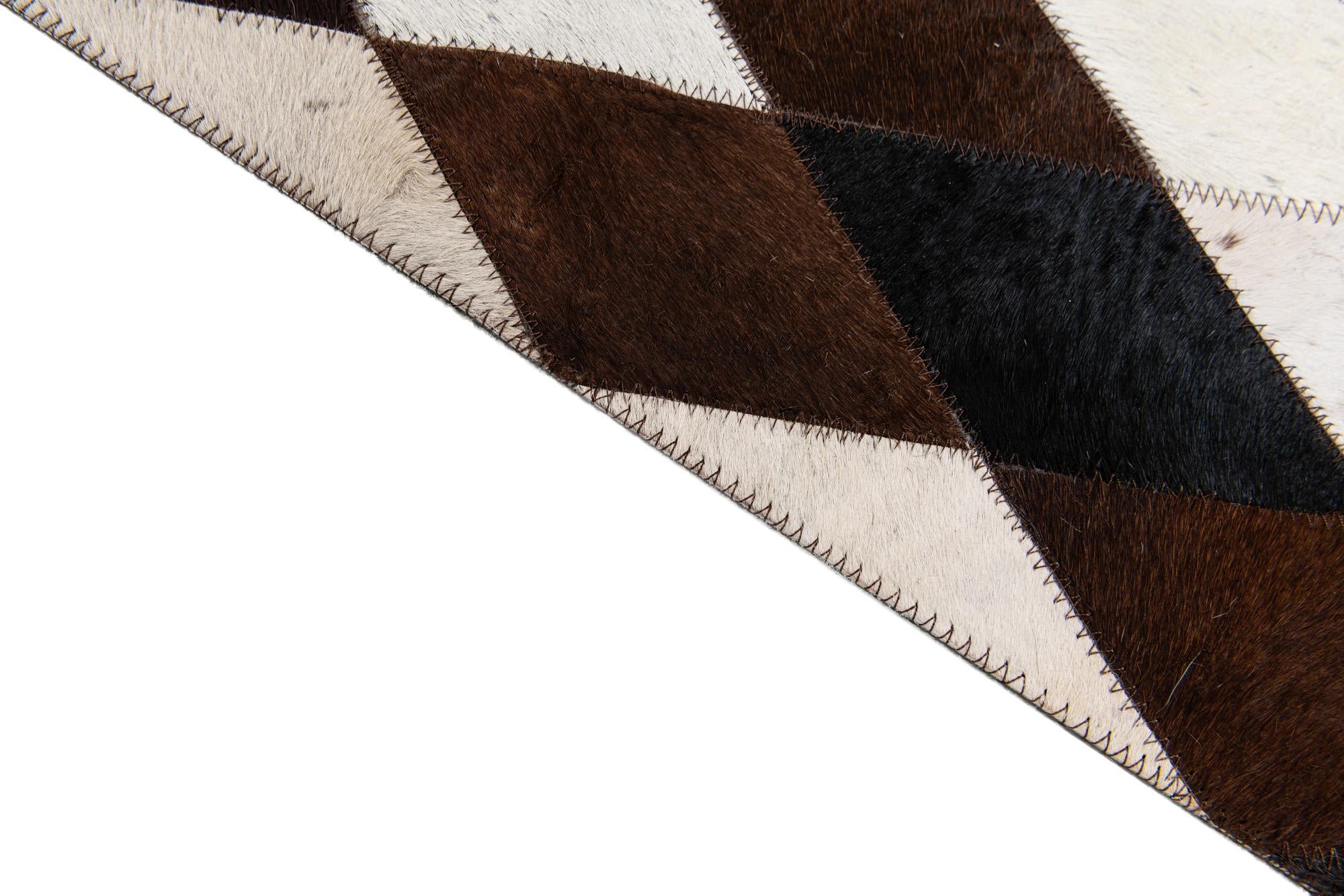 5' 3 x 8' Cowhide Stocks Rug
