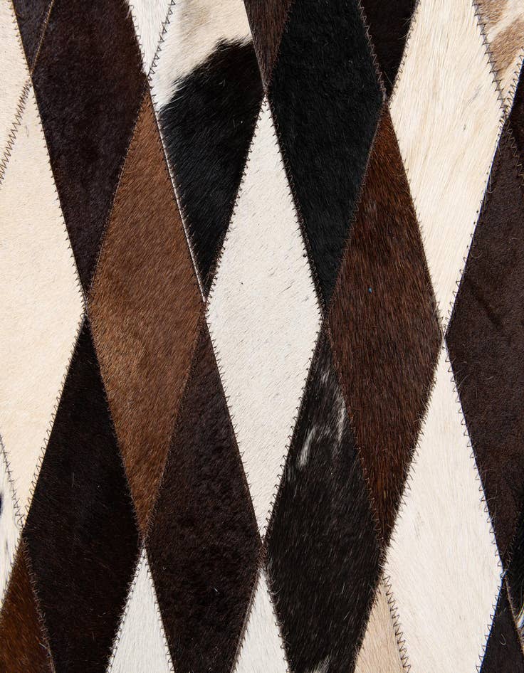 Detail image of 5' 3 x 8' Cowhide Stocks Rug