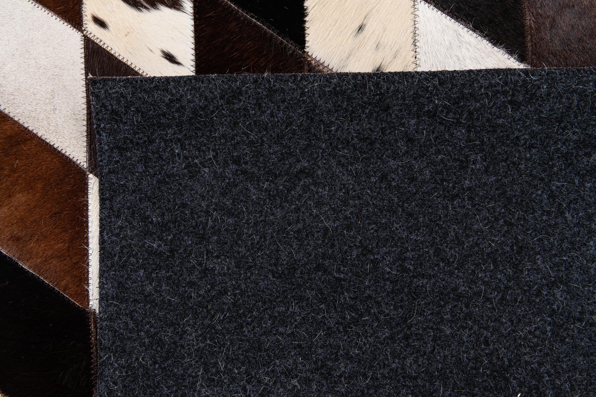 5' 3 x 8' Cowhide Stocks Rug