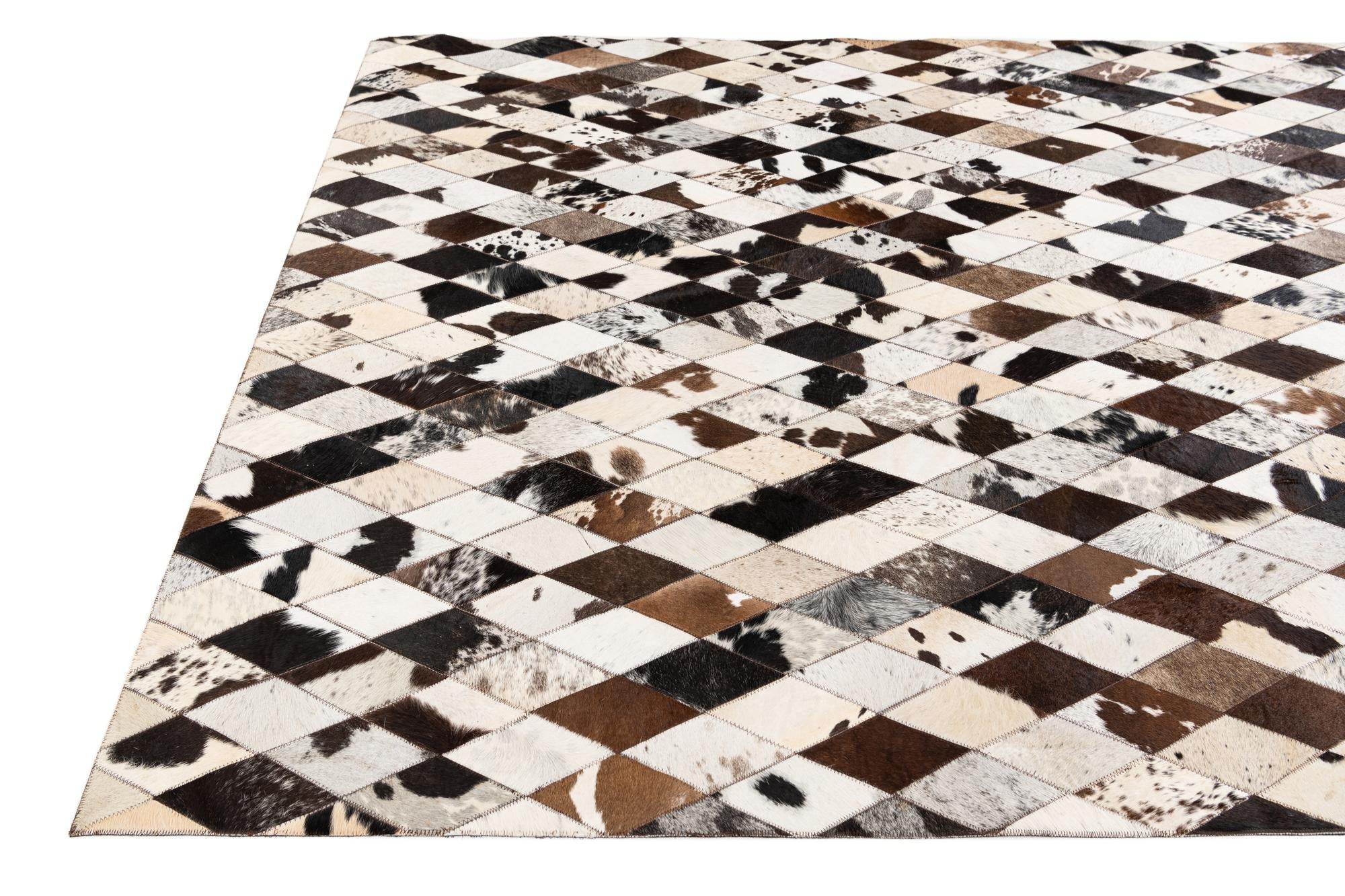5' 7 x 8' Cowhide Stocks Rug