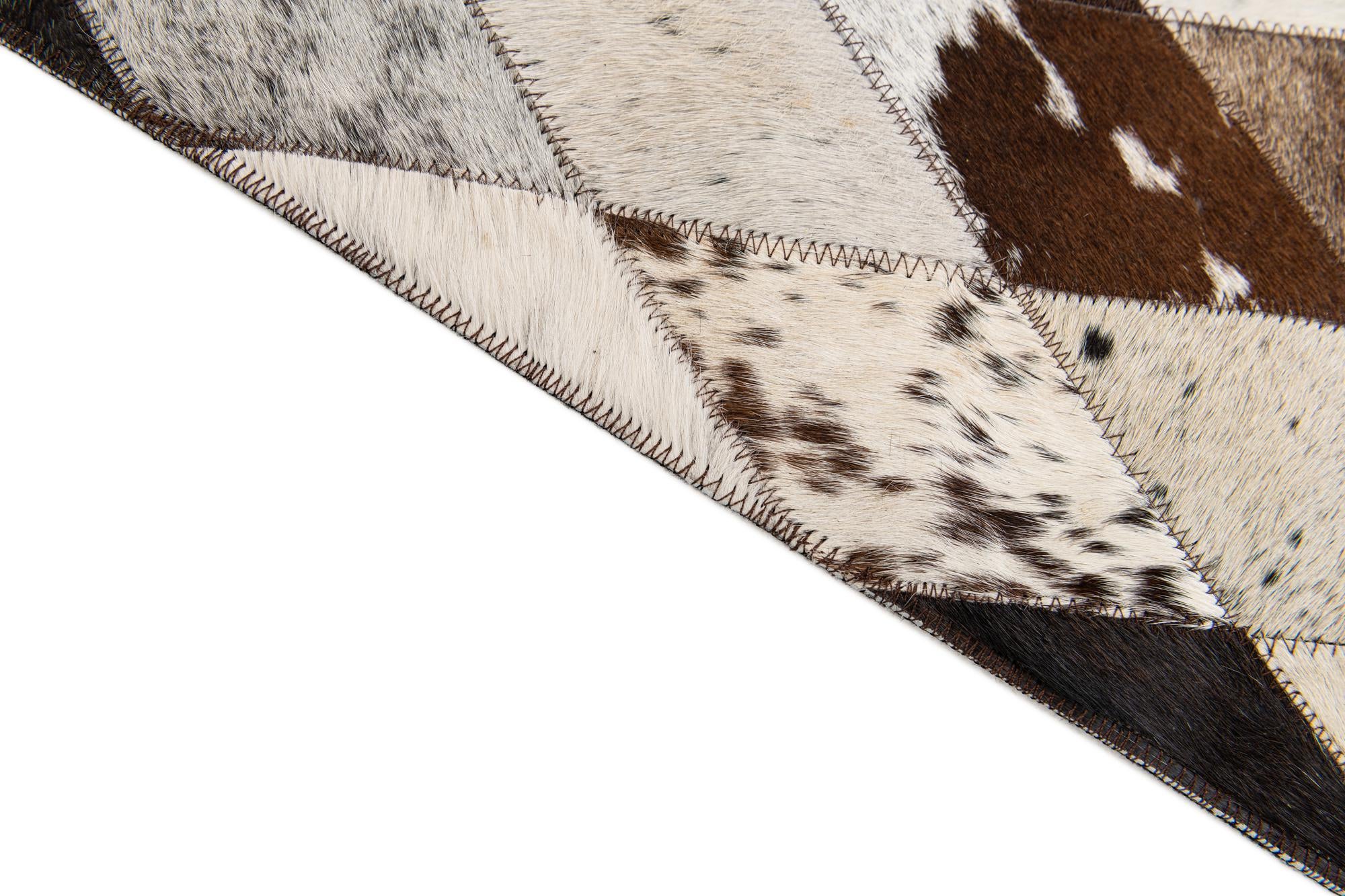 5' 7 x 8' Cowhide Stocks Rug