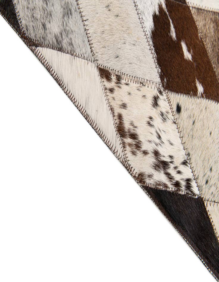 Detail image of 5' 7 x 8' Cowhide Stocks Rug