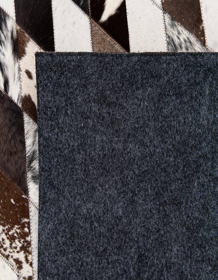 Detail image of 5' 7 x 8' Cowhide Stocks Rug