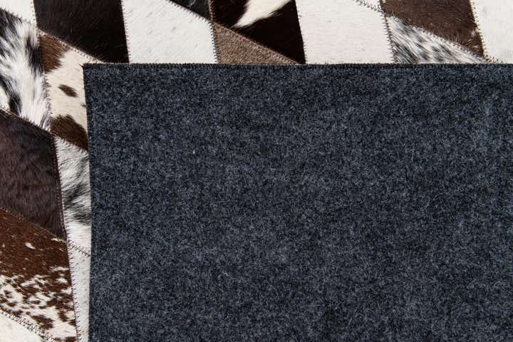5' 7 x 8' Cowhide Stocks Rug