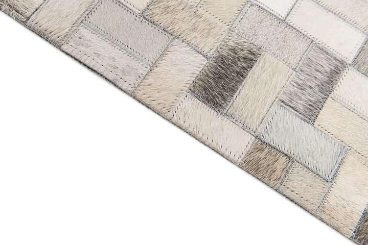 5' 7 x 7' 10 Cowhide Stocks Rug