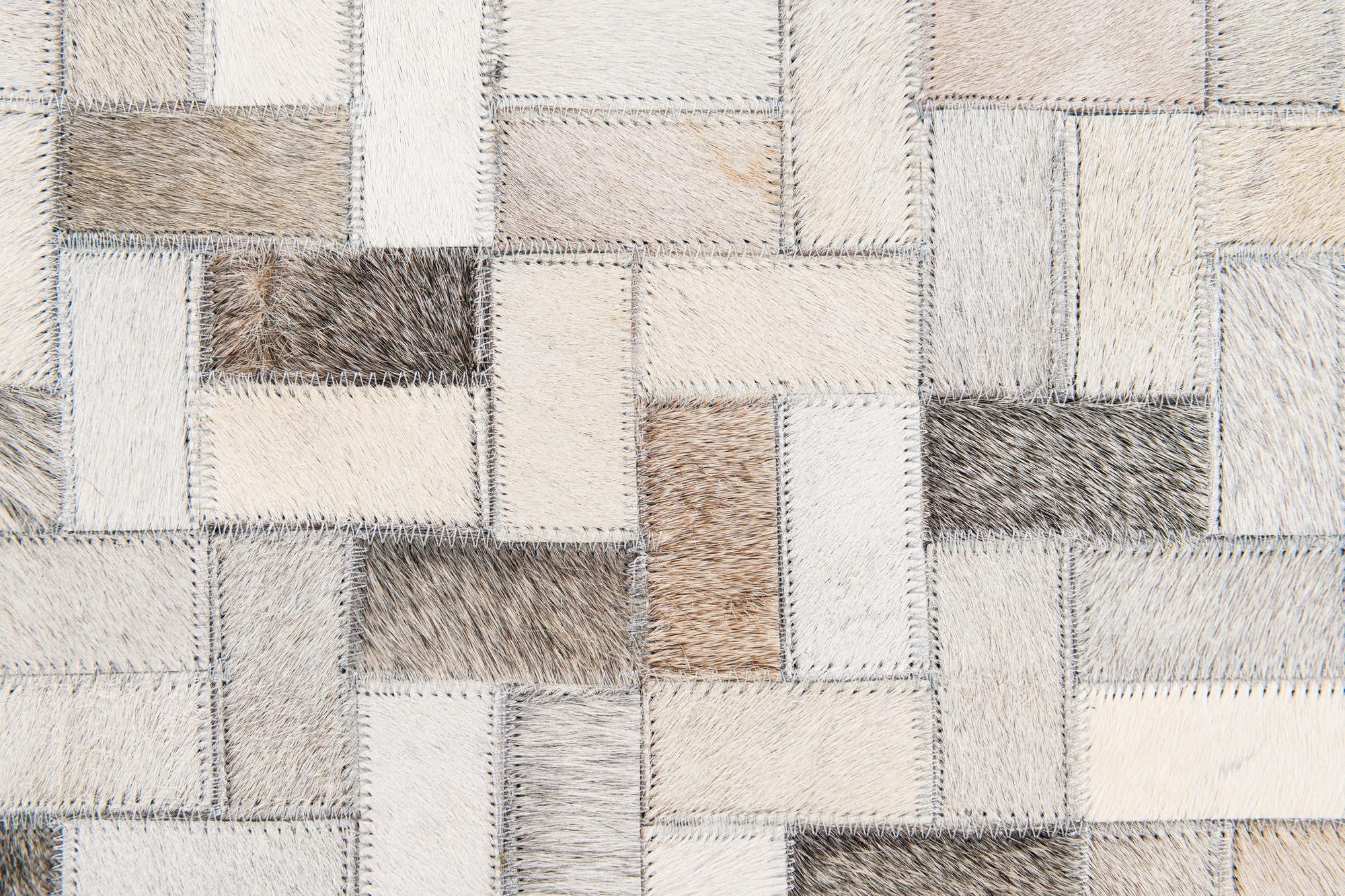 5' 7 x 7' 10 Cowhide Stocks Rug