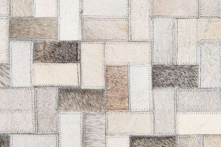 5' 7 x 7' 10 Cowhide Stocks Rug