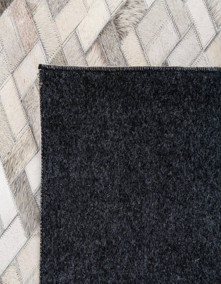 Detail image of 5' 7 x 7' 10 Cowhide Stocks Rug