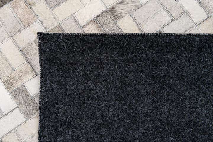 5' 7 x 7' 10 Cowhide Stocks Rug