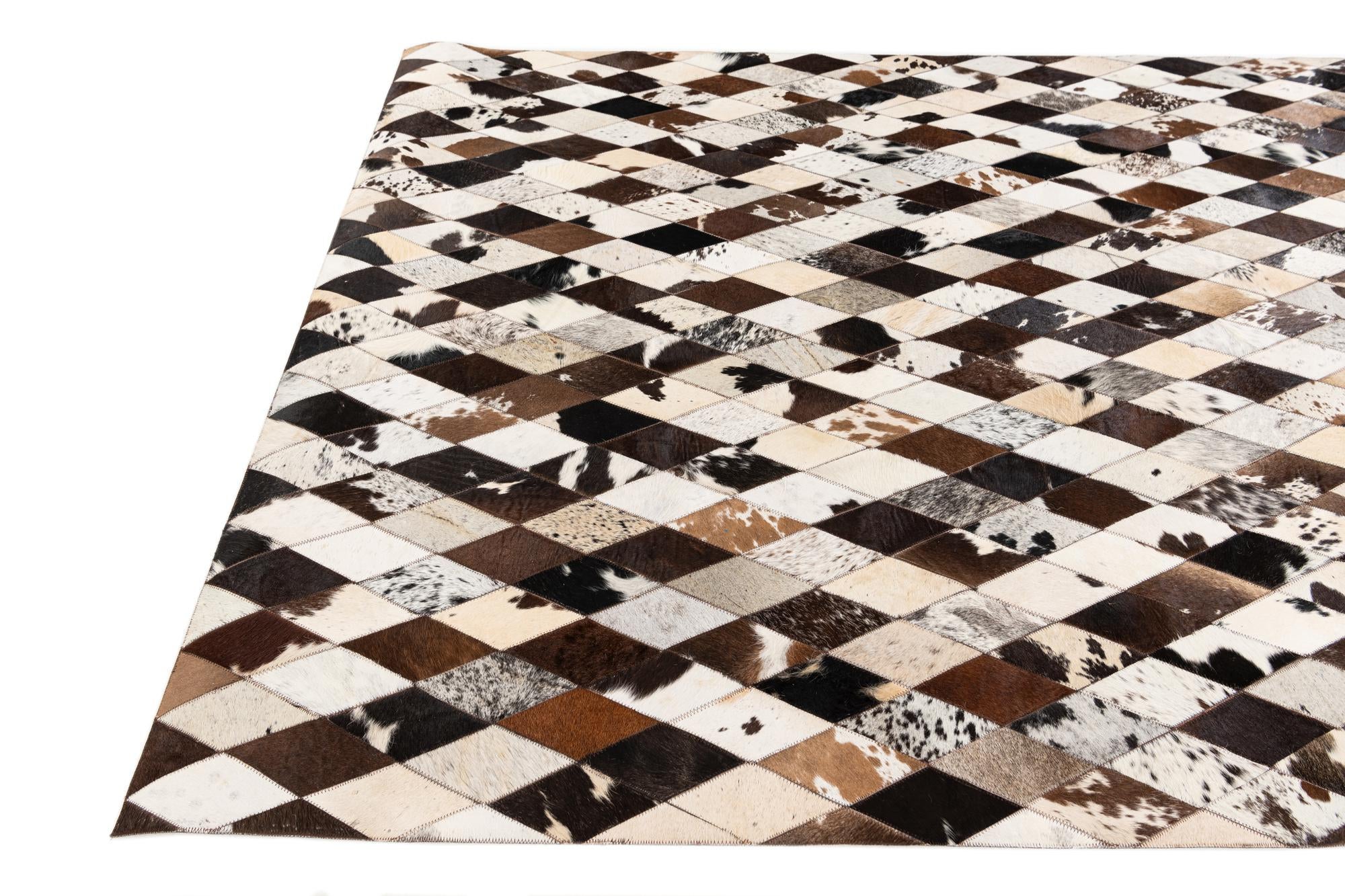 5' 7 x 7' 10 Cowhide Stocks Rug