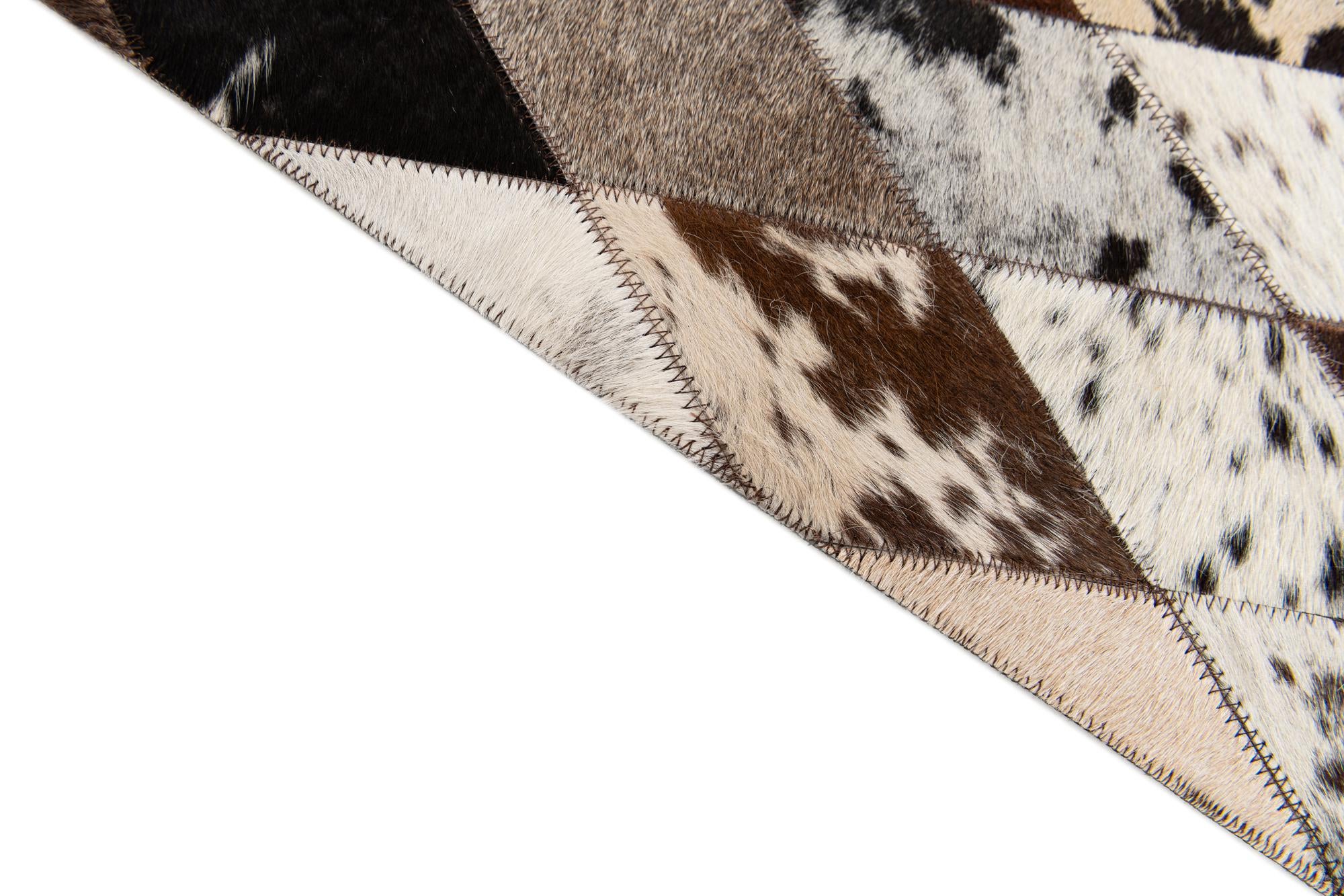 5' 7 x 7' 10 Cowhide Stocks Rug