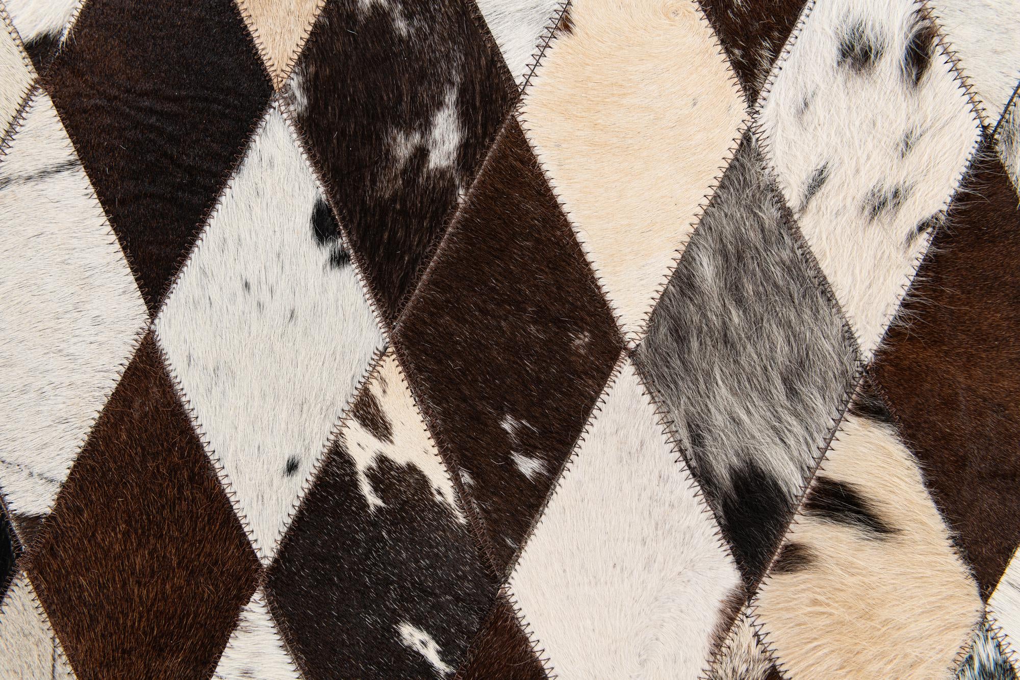 5' 7 x 7' 10 Cowhide Stocks Rug