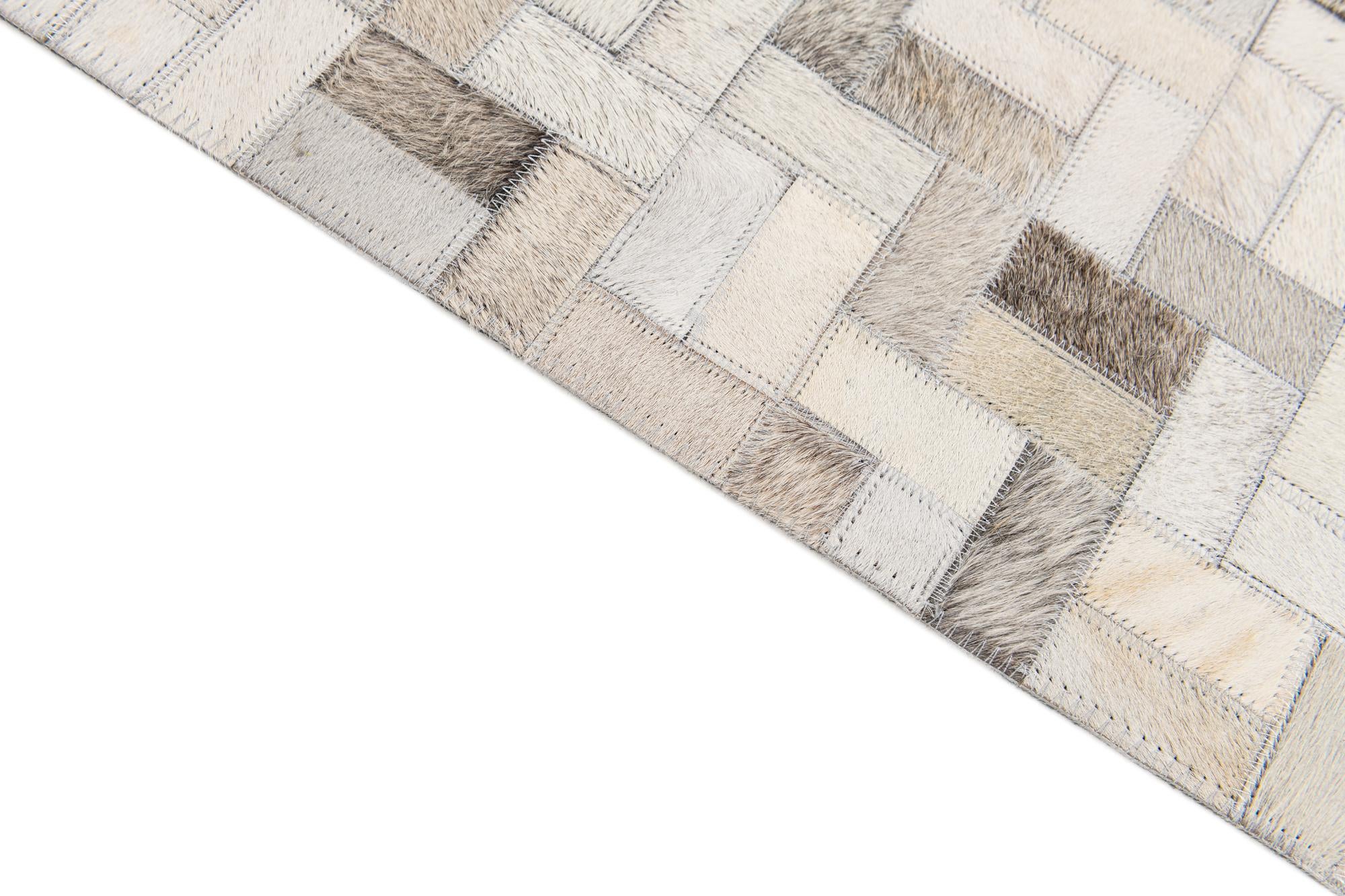 5' 7 x 8' Cowhide Stocks Rug
