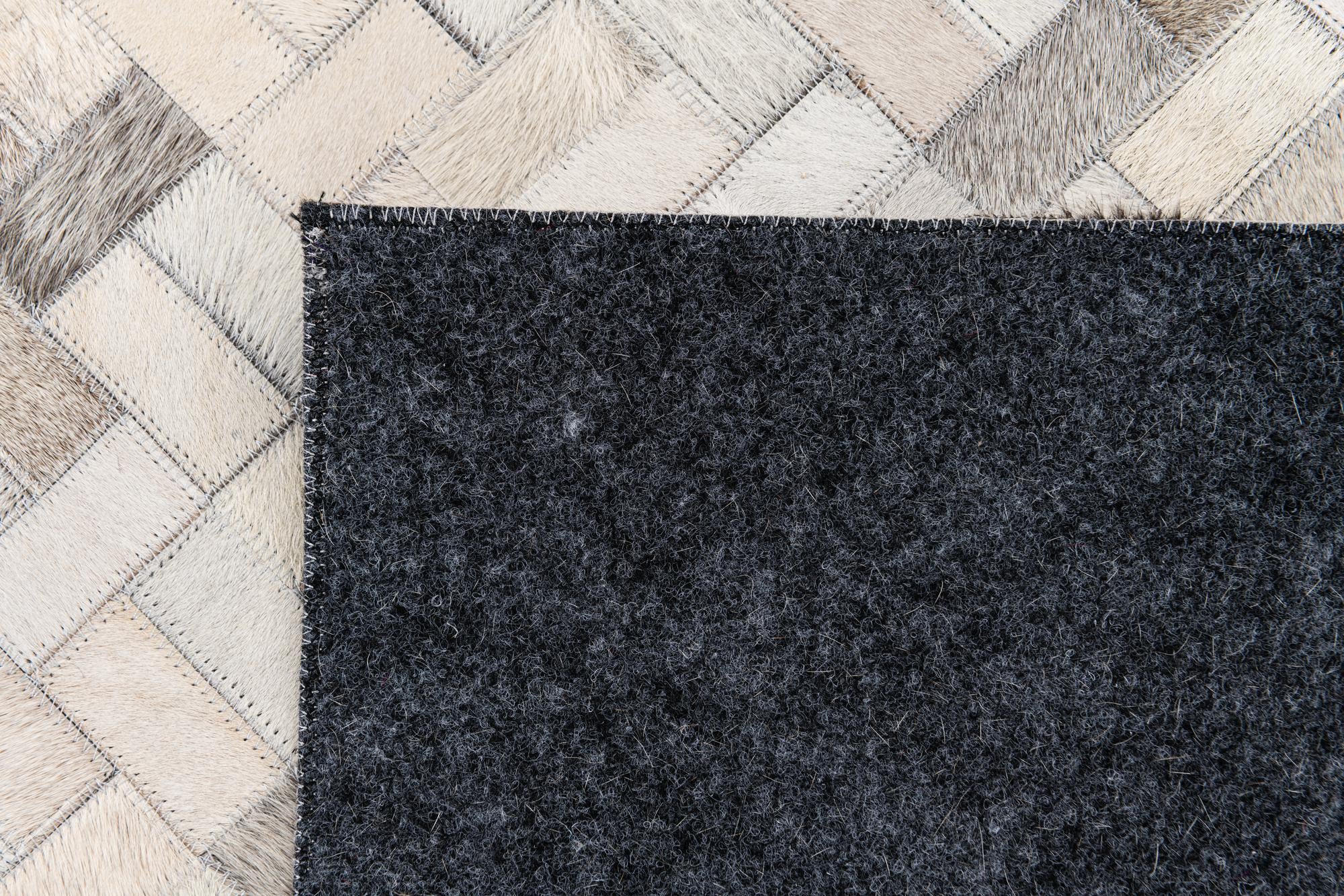5' 7 x 8' Cowhide Stocks Rug