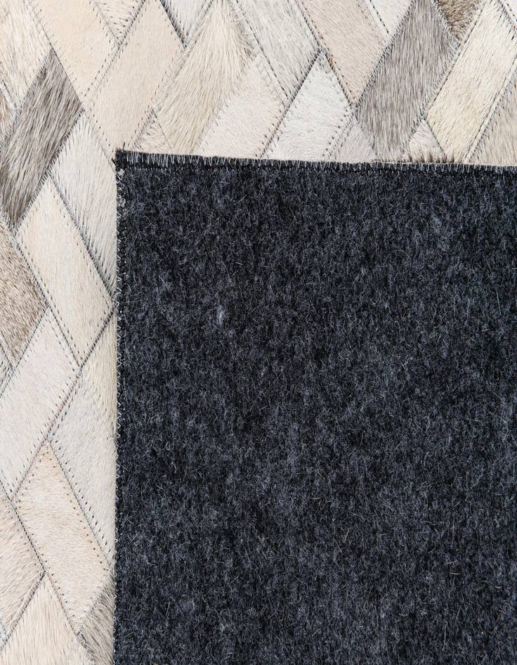 Detail image of 5' 7 x 8' Cowhide Stocks Rug