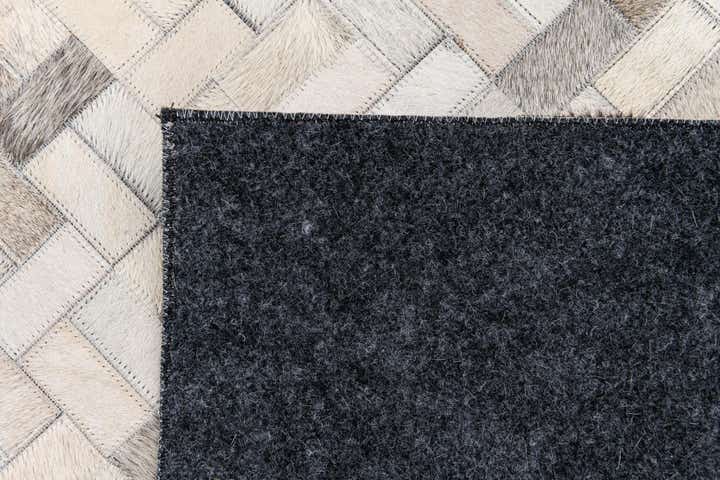 5' 7 x 8' Cowhide Stocks Rug