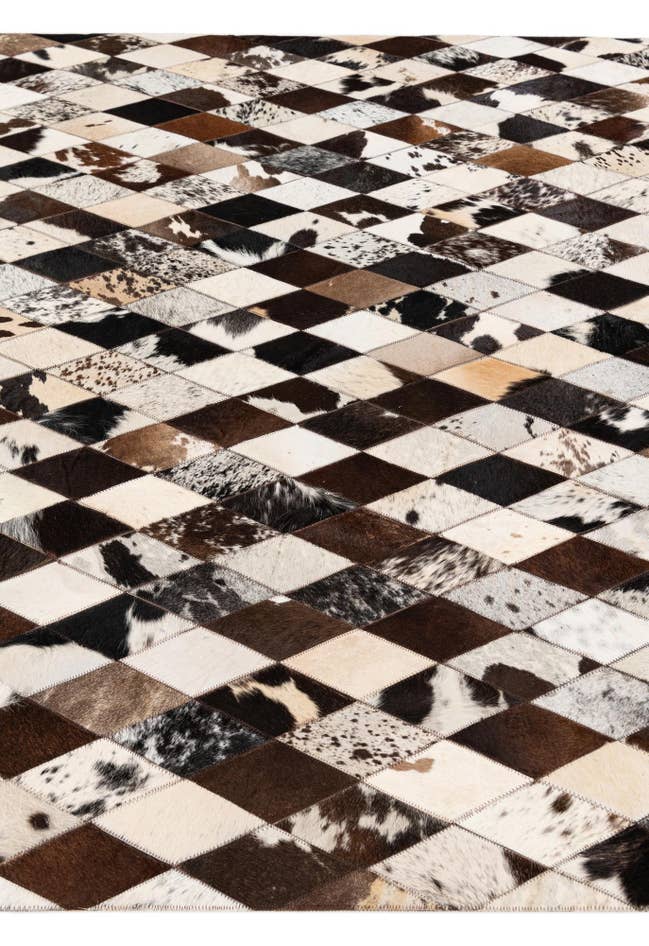 Detail image of 5' 7 x 8' Cowhide Stocks Rug