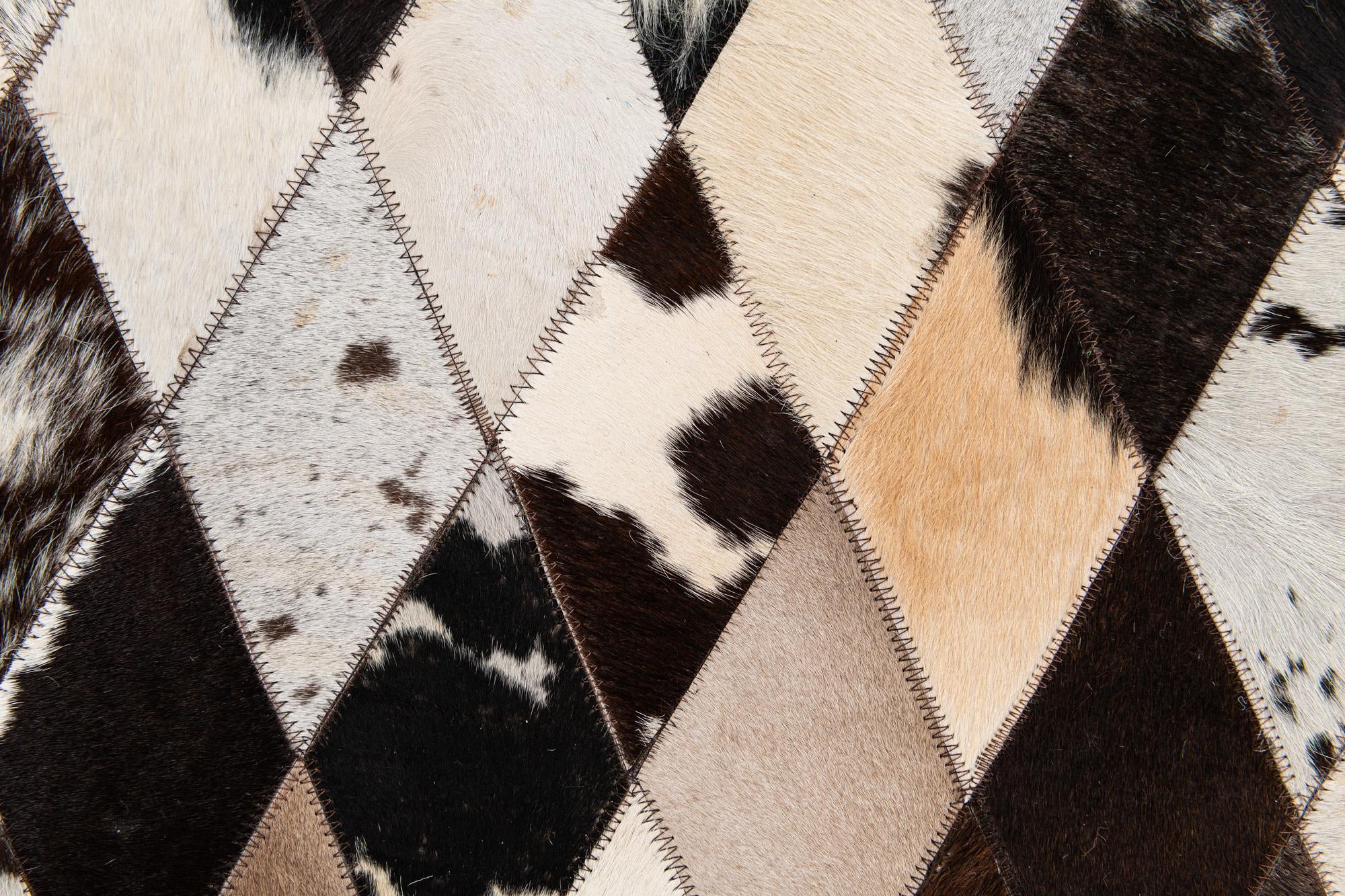 5' 7 x 8' Cowhide Stocks Rug