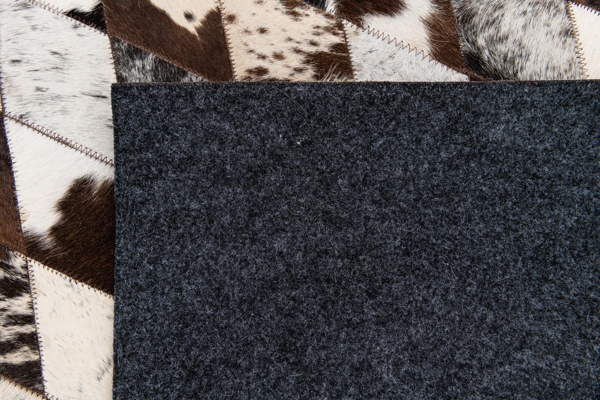 5' 8 x 7' 11 Cowhide Stocks Rug