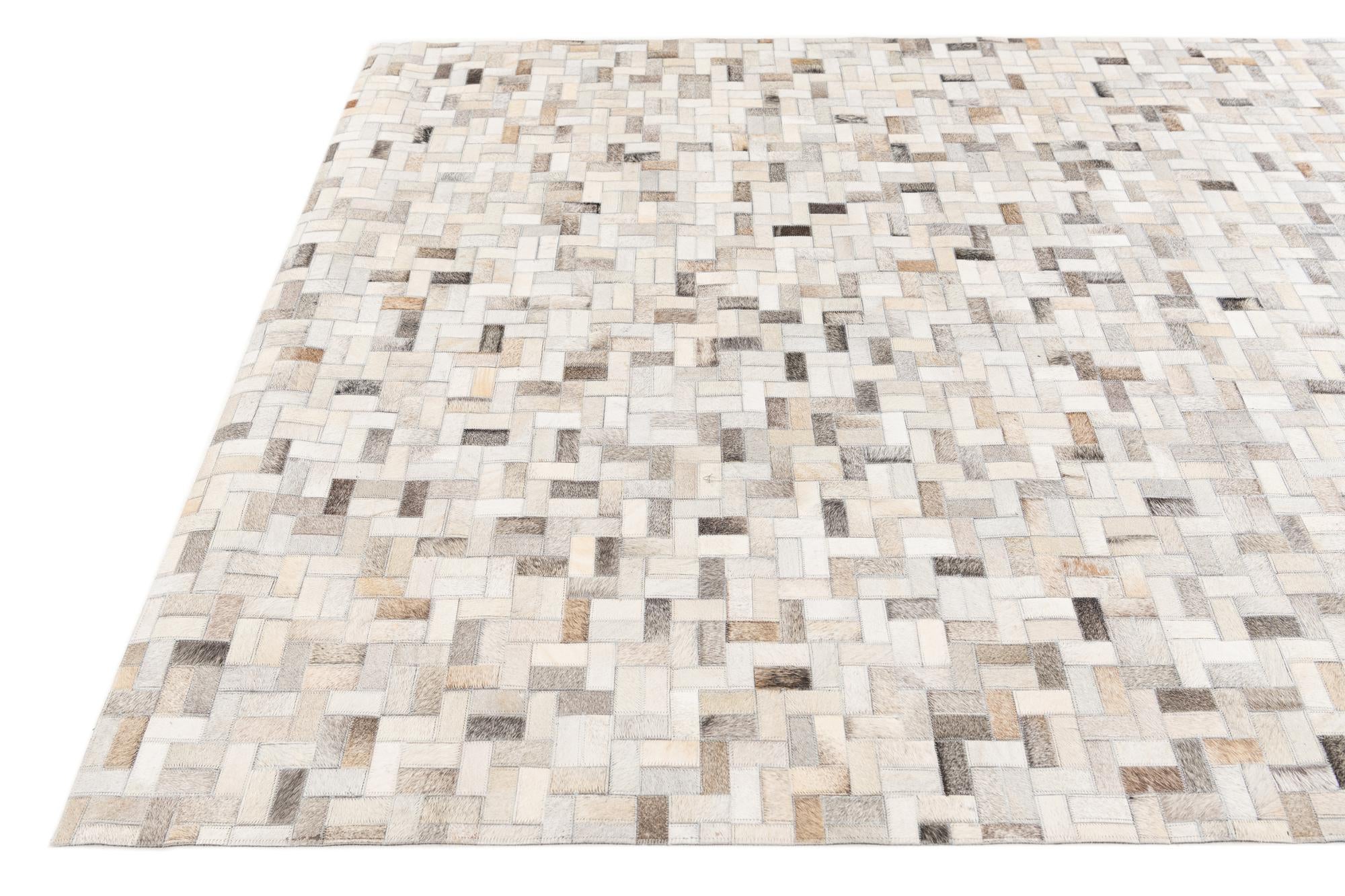 5' 7 x 7' 10 Cowhide Stocks Rug