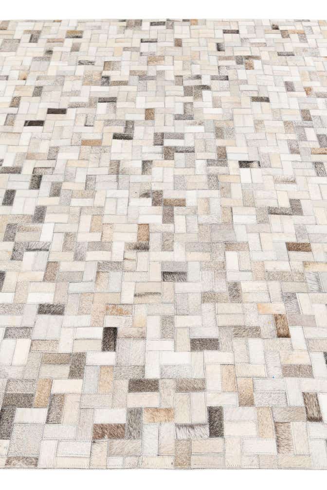 5' 7 x 7' 10 Cowhide Stocks Rug