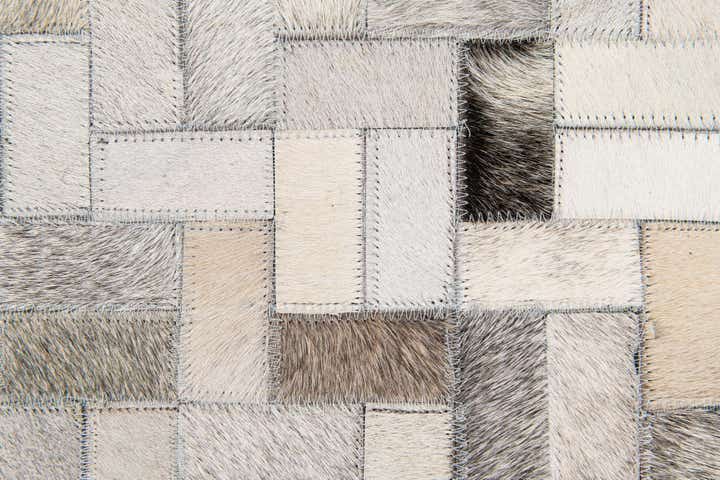 5' 7 x 7' 10 Cowhide Stocks Rug