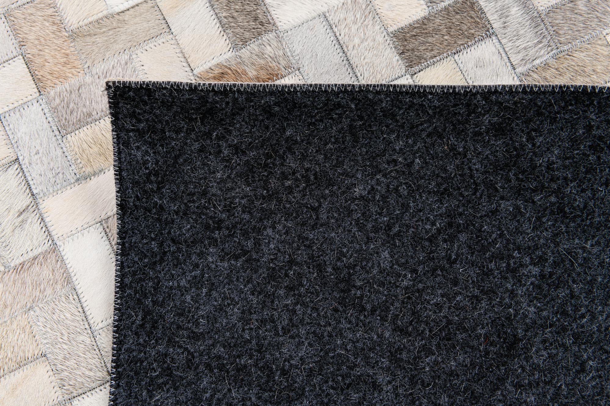 5' 7 x 7' 10 Cowhide Stocks Rug