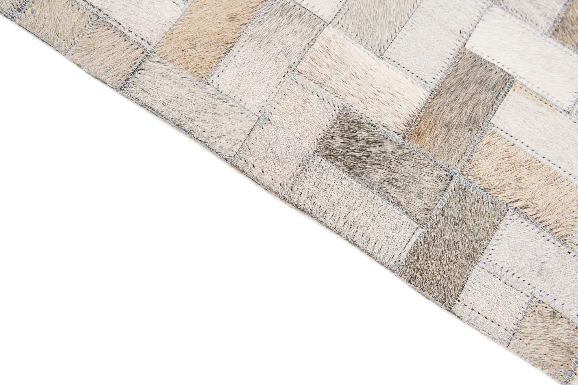5' 7 x 7' 11 Cowhide Stocks Rug