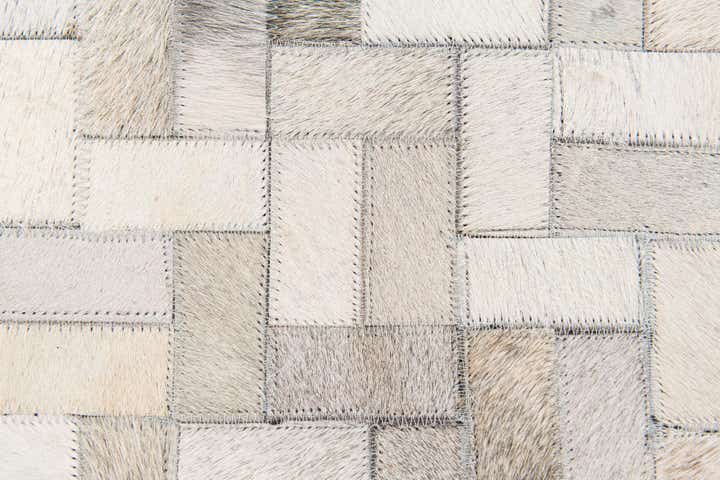 5' 7 x 7' 11 Cowhide Stocks Rug