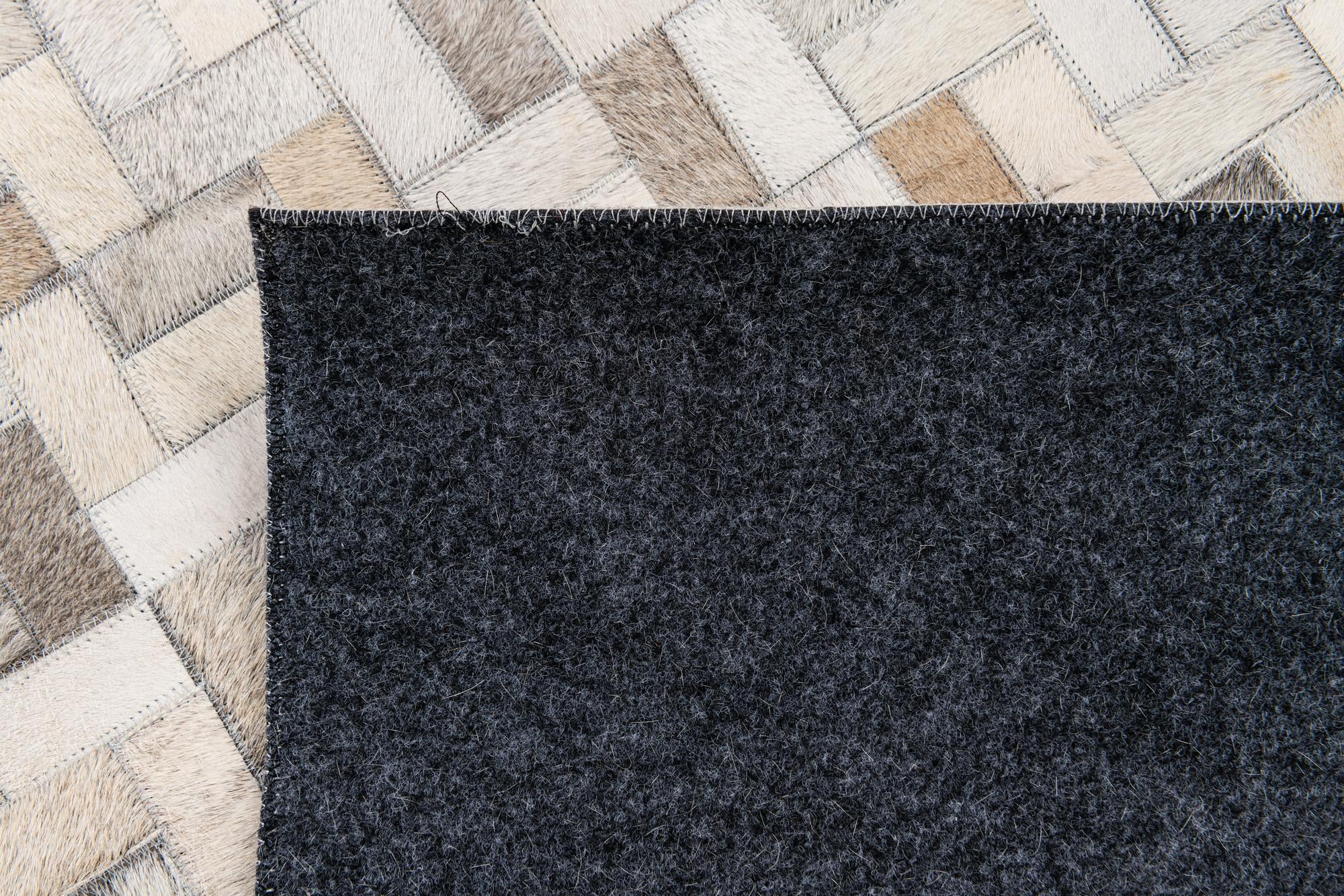5' 7 x 7' 11 Cowhide Stocks Rug