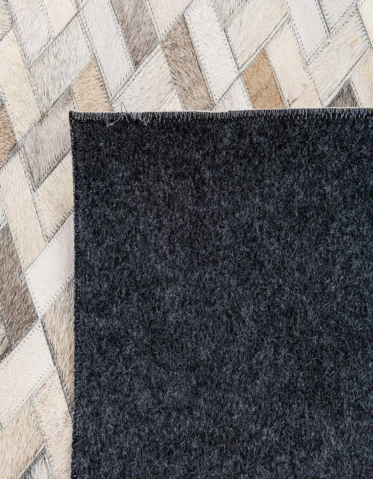 Detail image of 5' 7 x 7' 11 Cowhide Stocks Rug