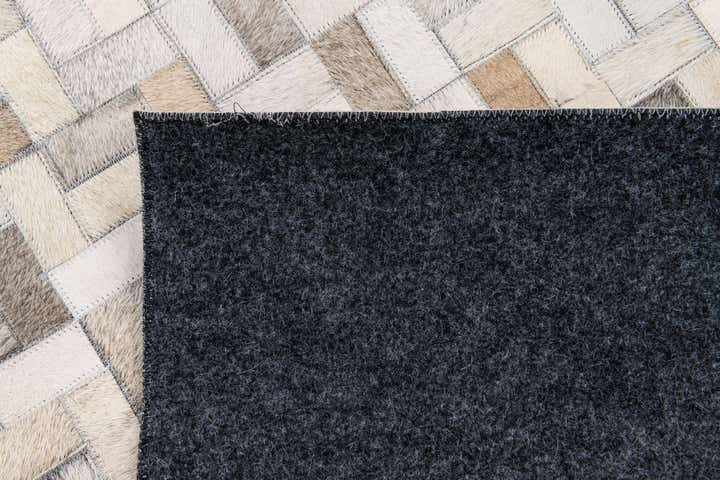 5' 7 x 7' 11 Cowhide Stocks Rug