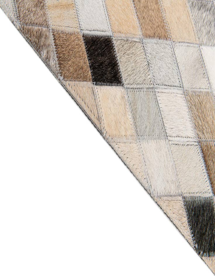 Detail image of 5' 6 x 8' Cowhide Stocks Rug