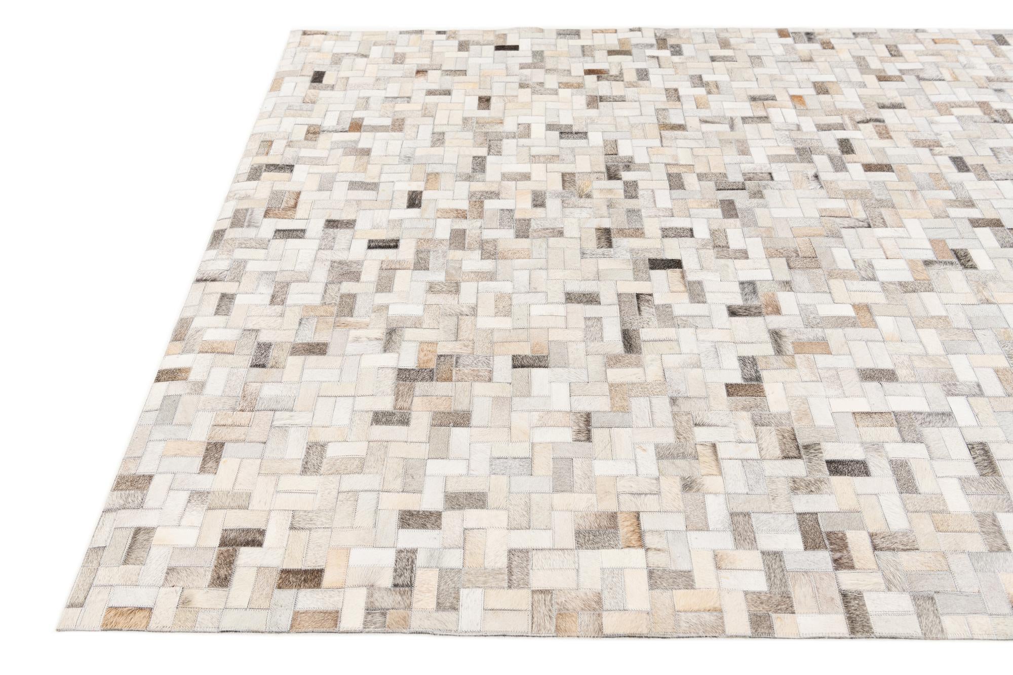 5' 7 x 7' 10 Cowhide Stocks Rug