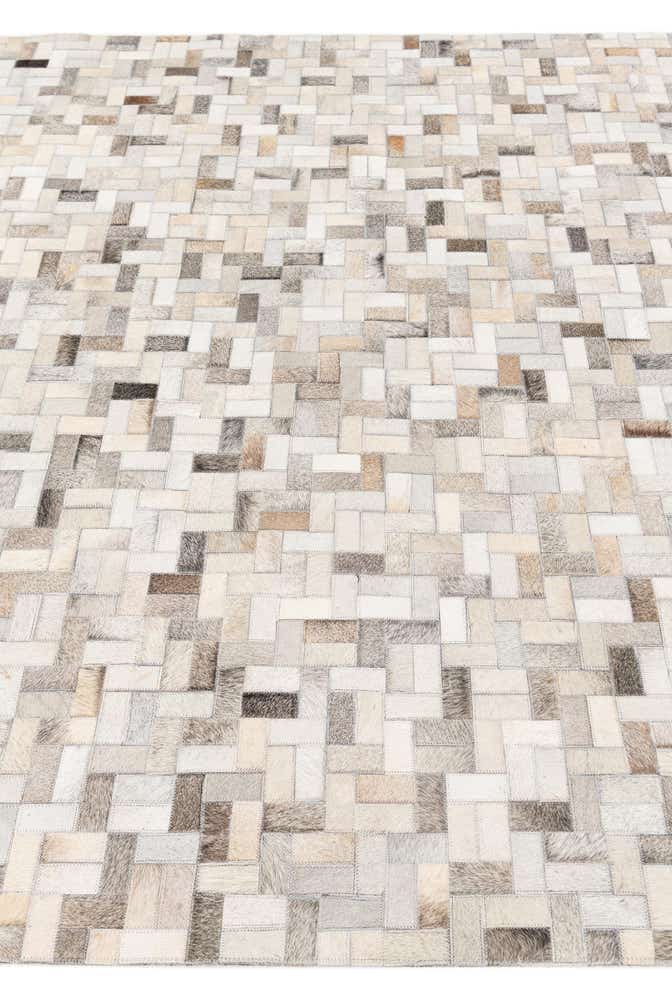 5' 7 x 7' 10 Cowhide Stocks Rug