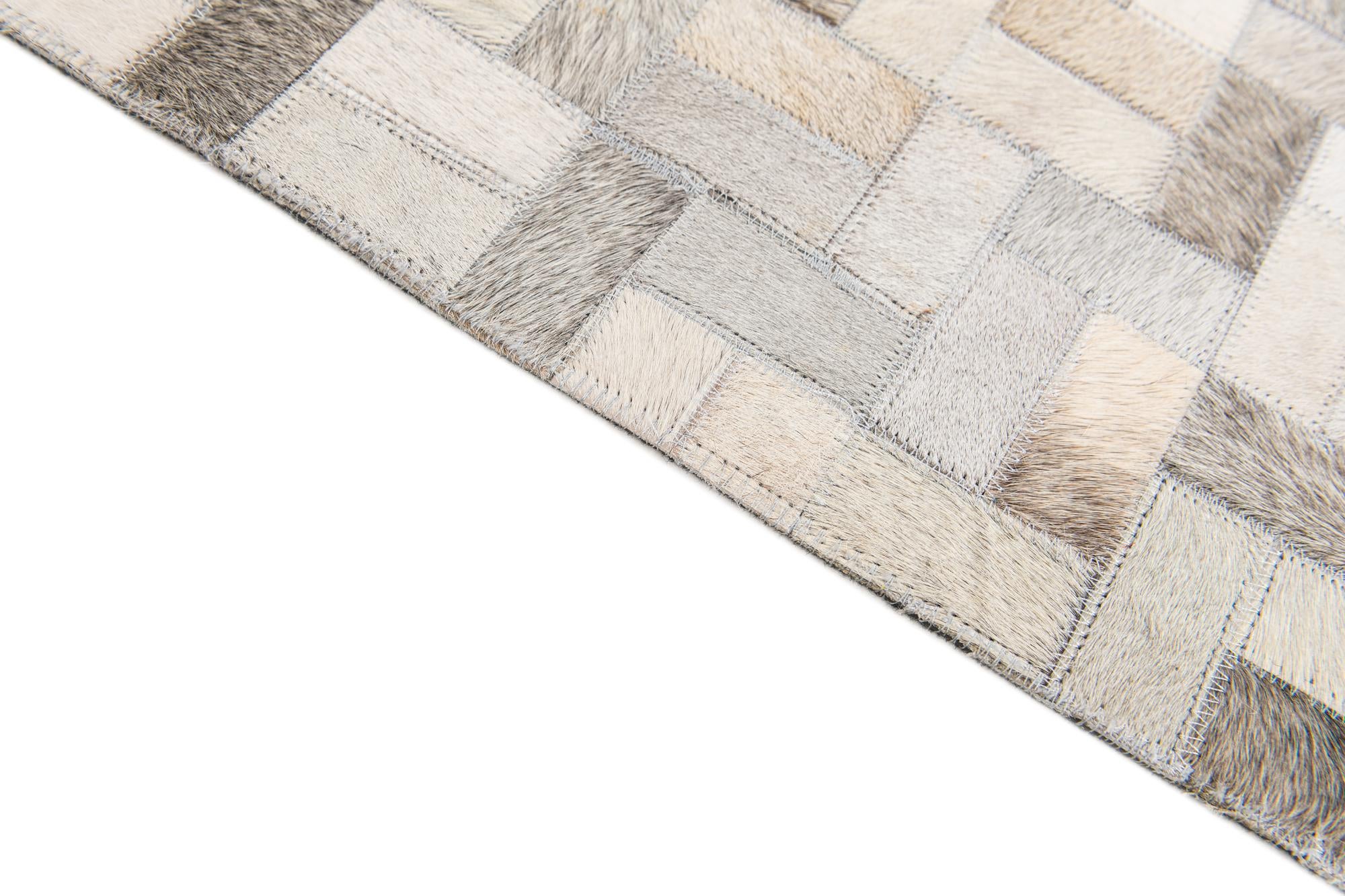 5' 7 x 7' 10 Cowhide Stocks Rug