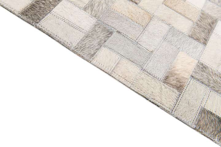 5' 7 x 7' 10 Cowhide Stocks Rug