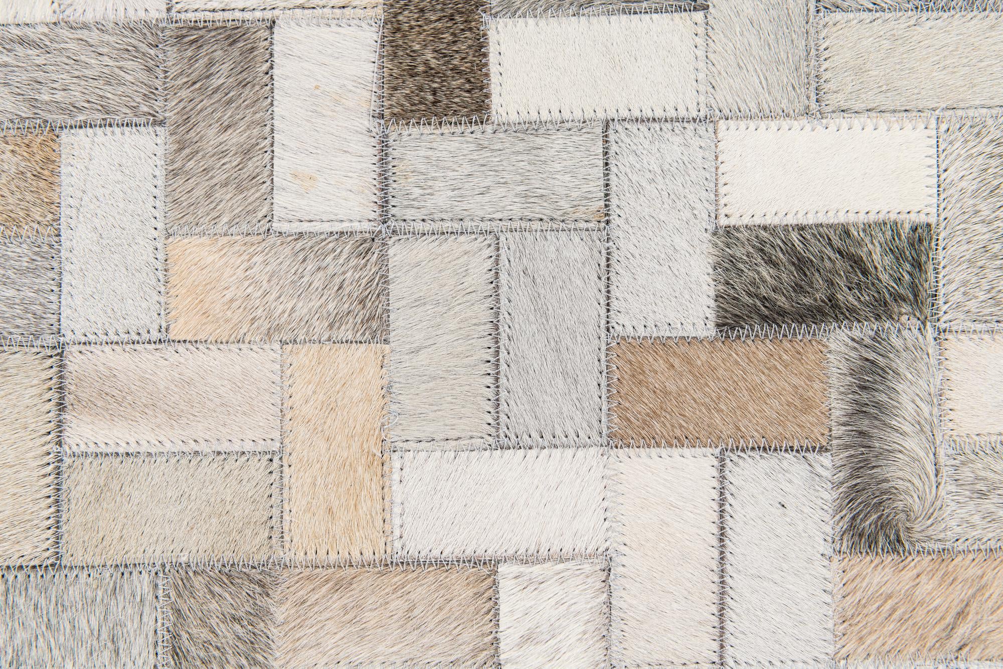 5' 7 x 7' 10 Cowhide Stocks Rug