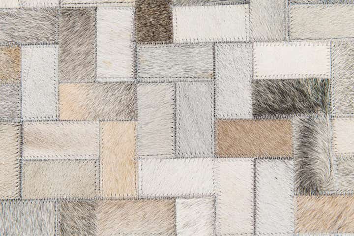 5' 7 x 7' 10 Cowhide Stocks Rug