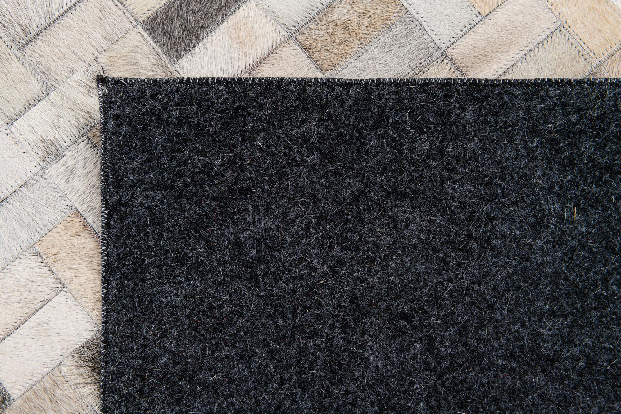 5' 7 x 7' 10 Cowhide Stocks Rug