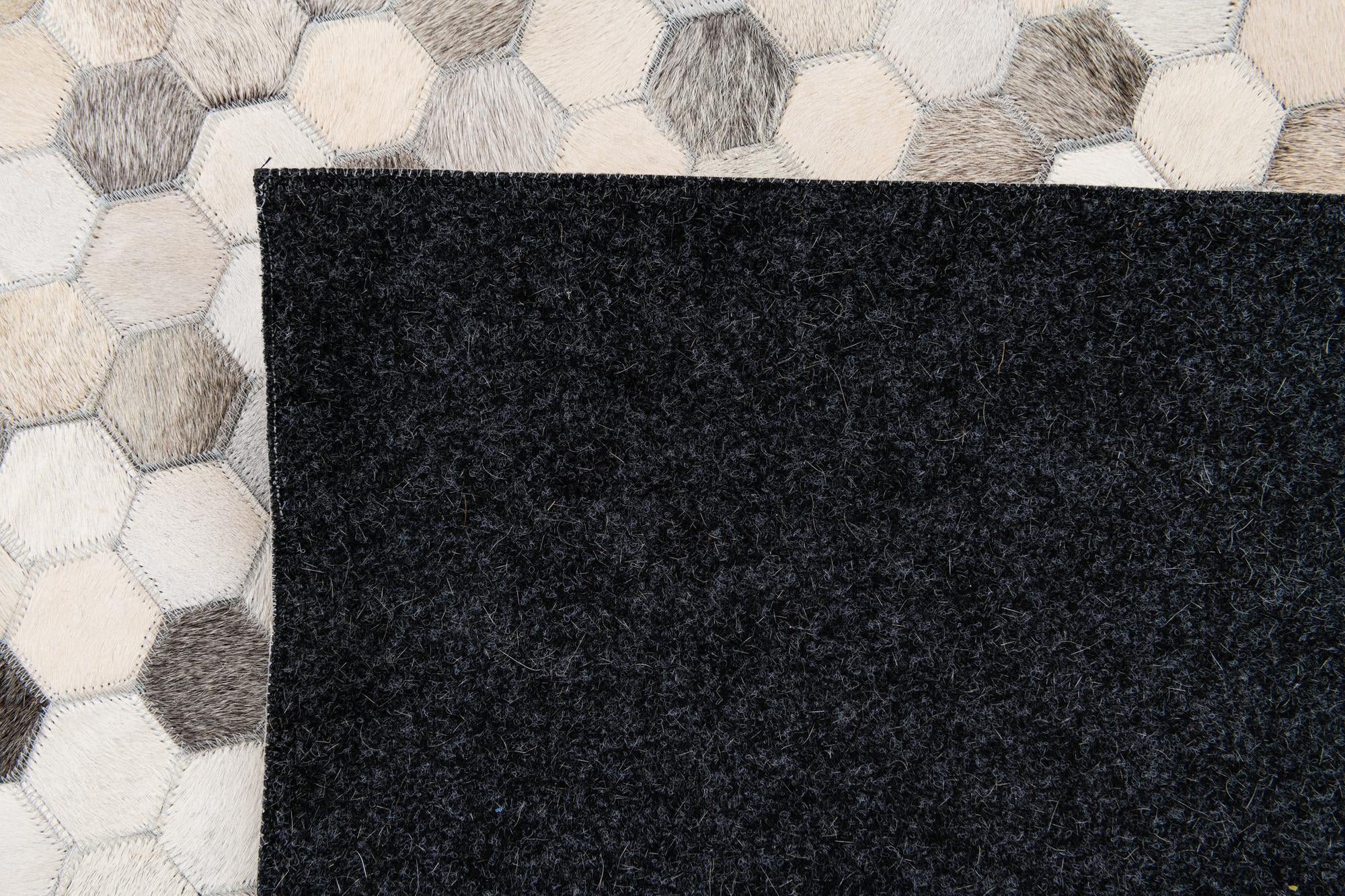 5' 8 x 7' 11 Cowhide Stocks Rug