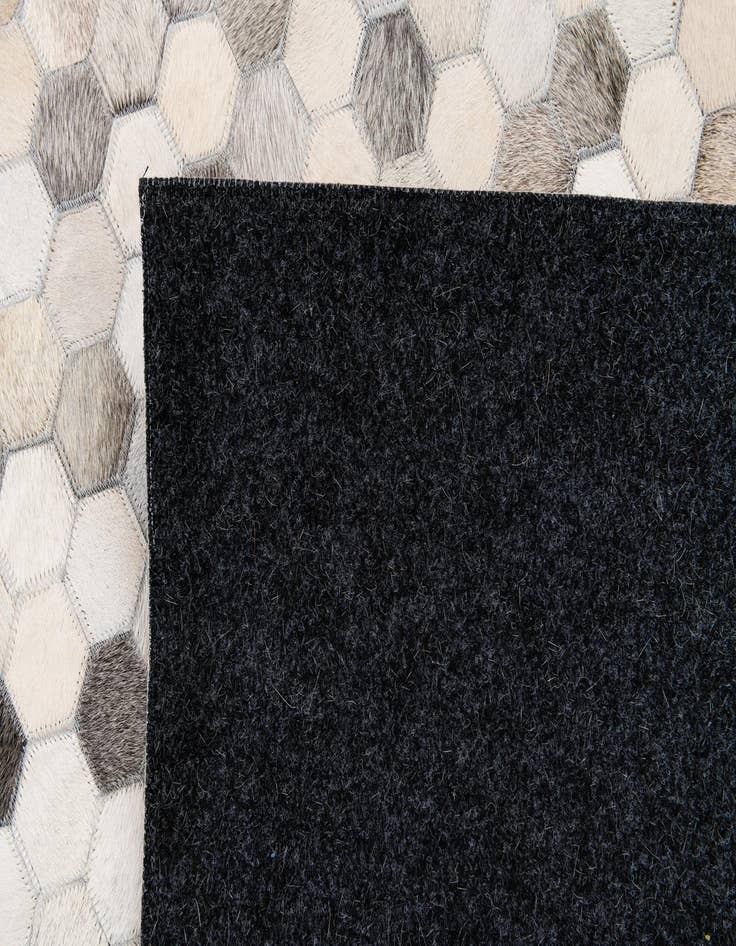 Detail image of 5' 8 x 7' 11 Cowhide Stocks Rug